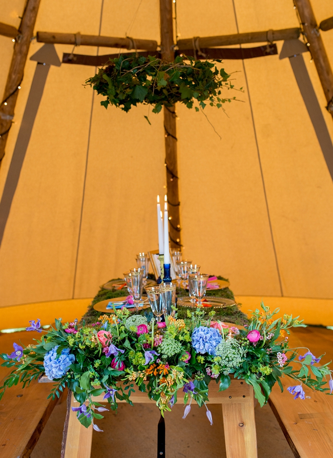 tipi wedding table with green moss
