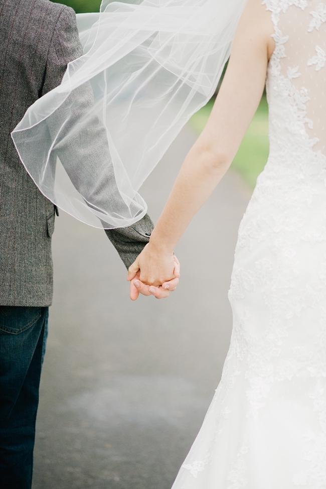holding hands with veil