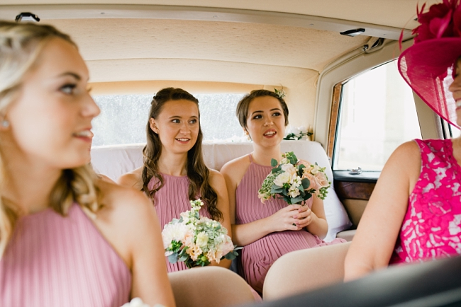 bridesmaids in car