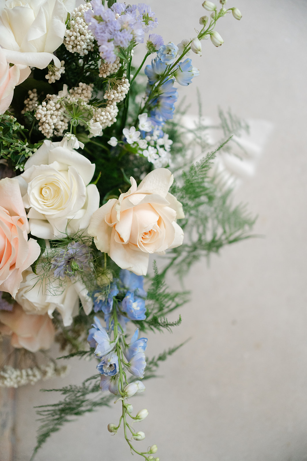 peach, pale blue and ivory wedding bouquet