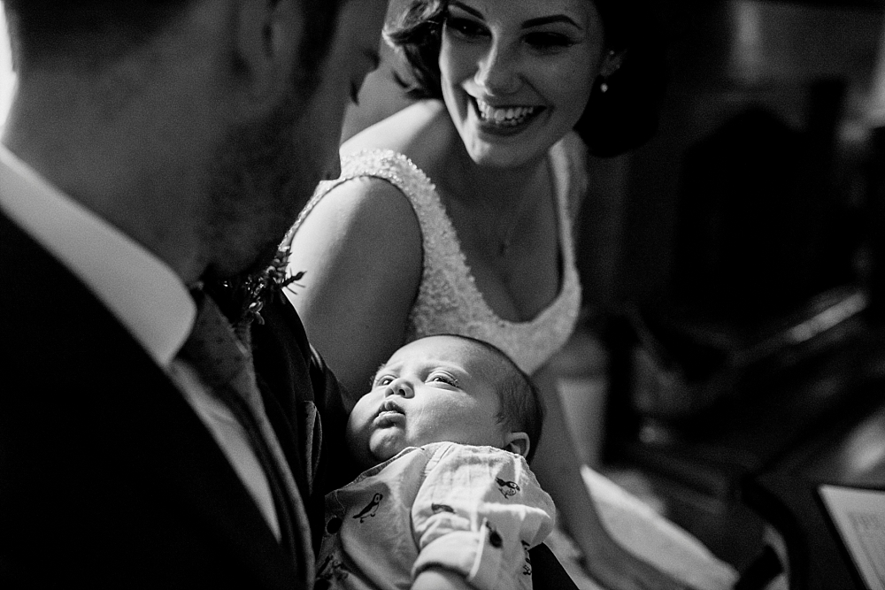 bride groom and baby