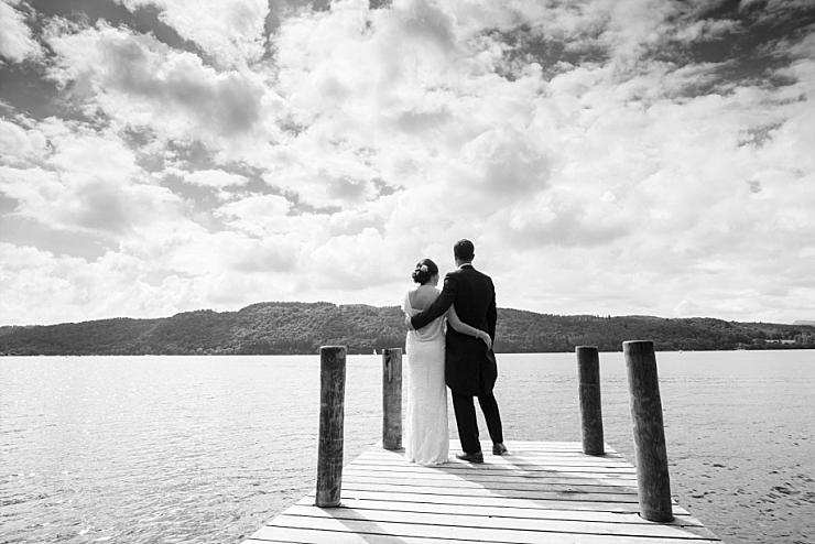 bride and groom on pier