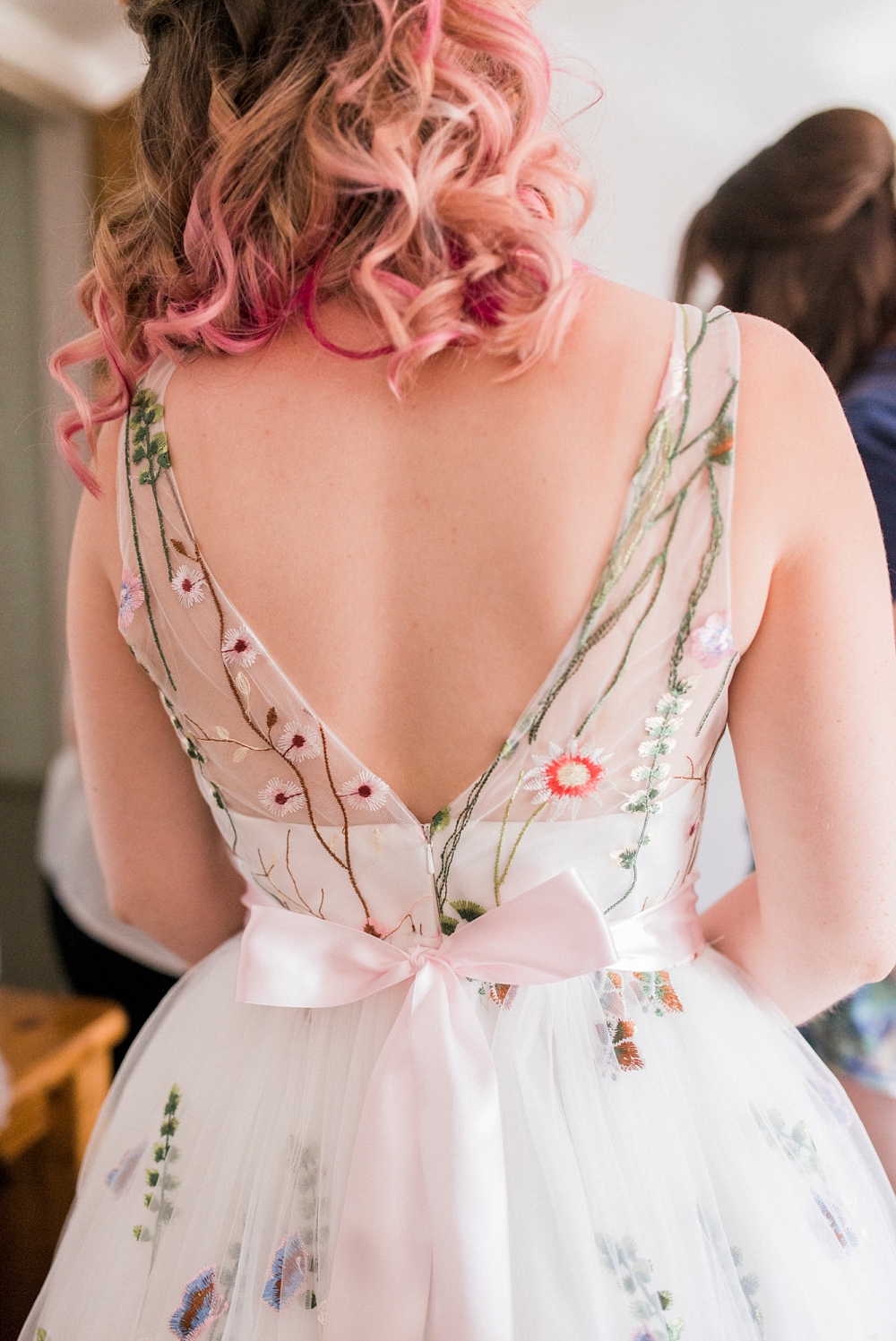 bride with pink hair and flower dress