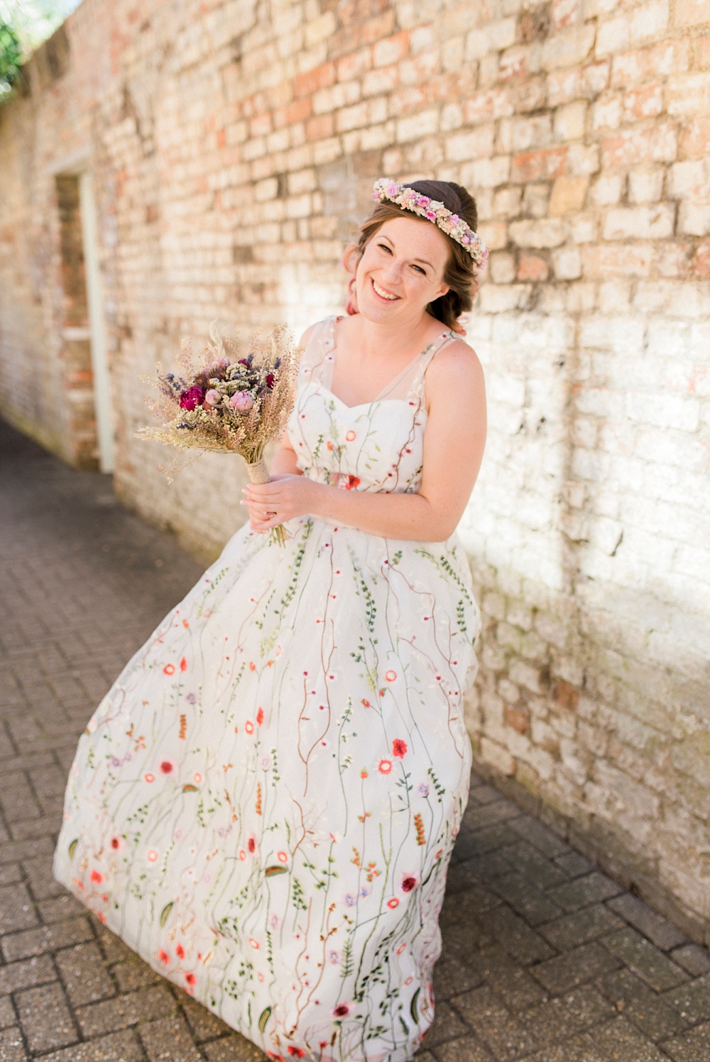 bride with floral wedding dress