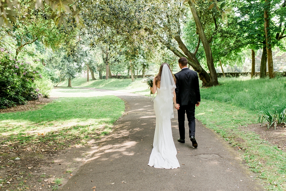 bride and groom photos in lowther gardens