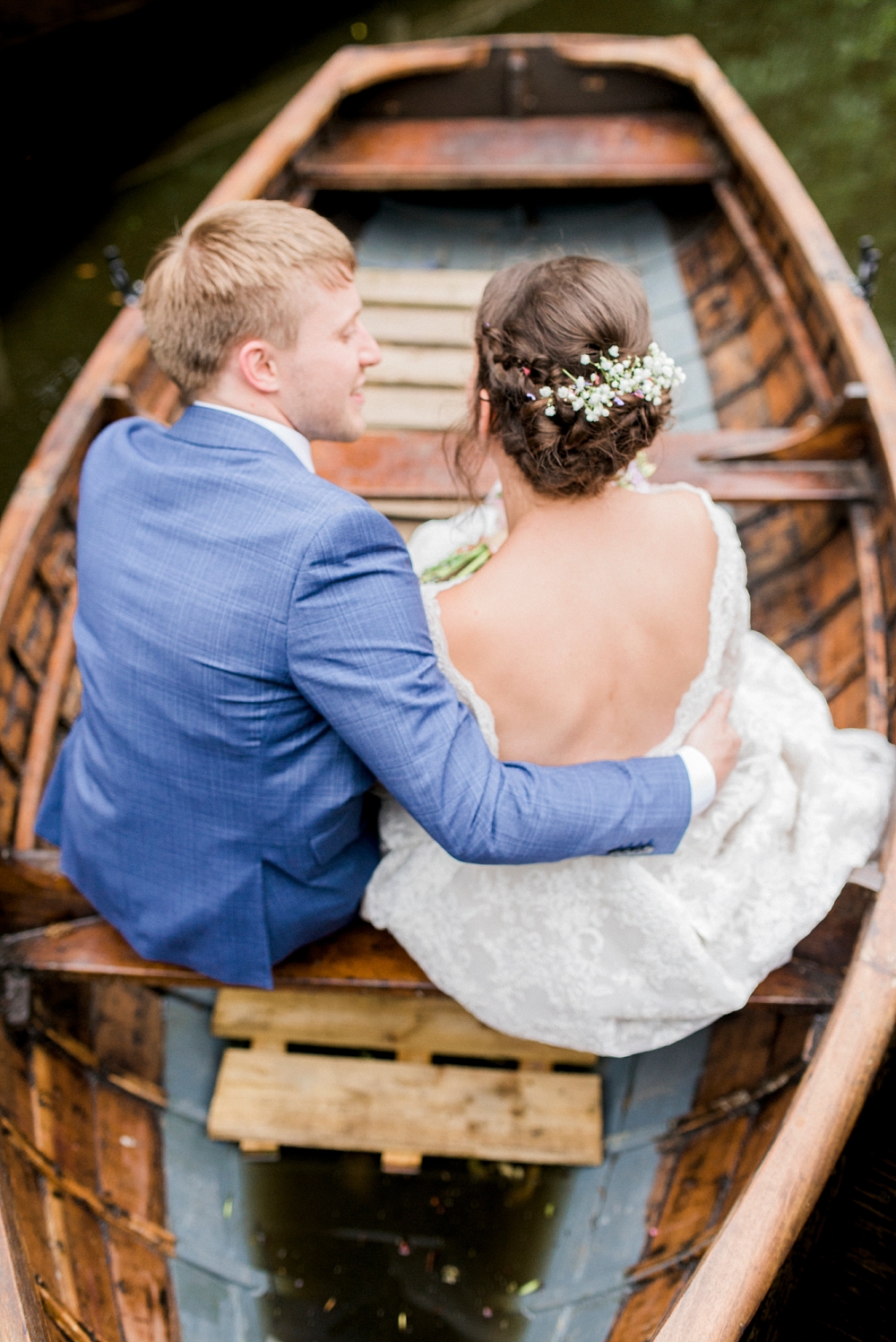 wyresdale park wedding bride and groom in a boat