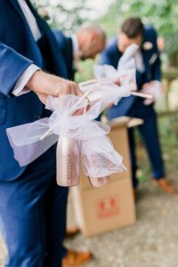 mini champagne bottles as wedding favours