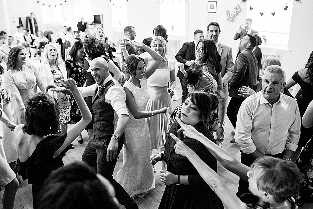 first dance with lively wedding guests