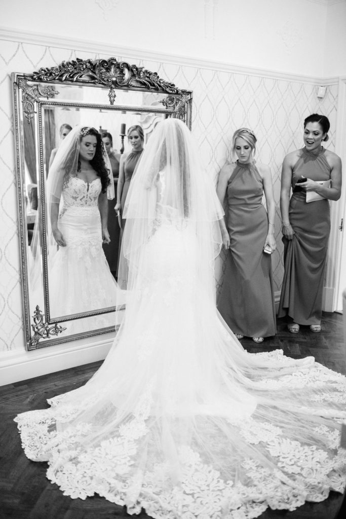 bride in front of mirror at home in birkenhead