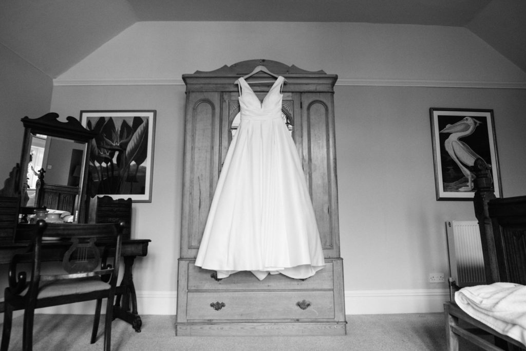 wedding dress hanging on wardrobe at wyresdale park