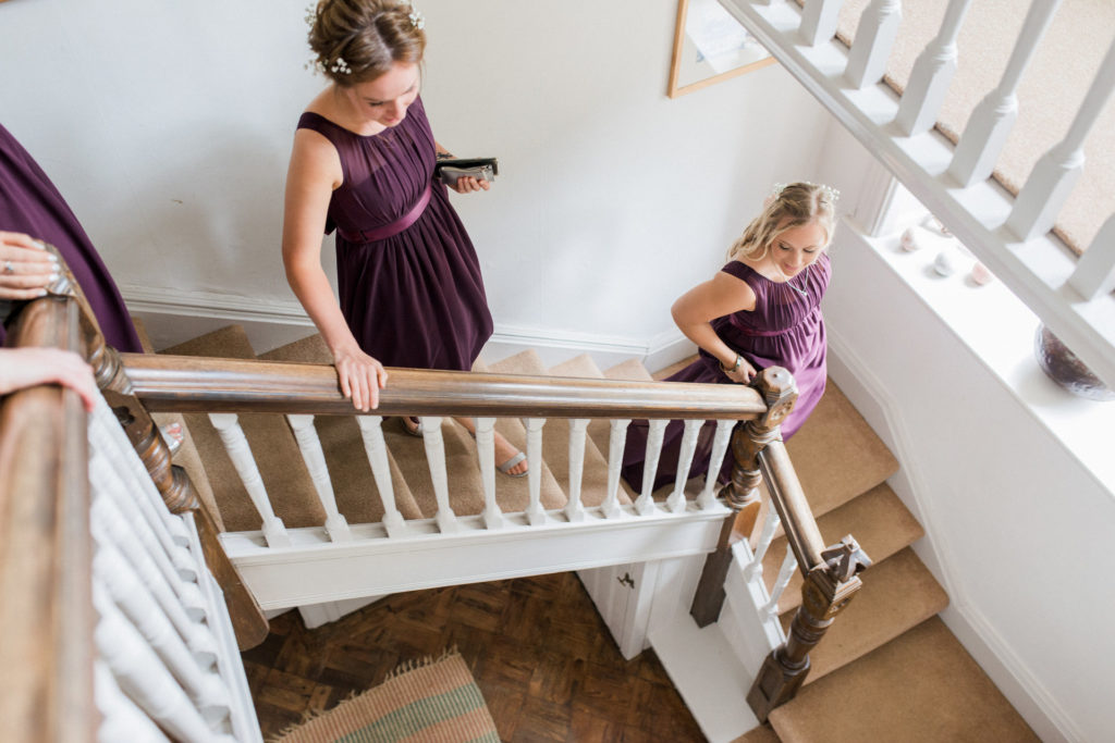 bridesmaids coming down the stairs at wyresdale park