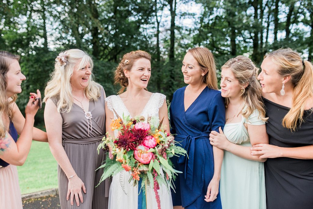 bride laughs with her friends