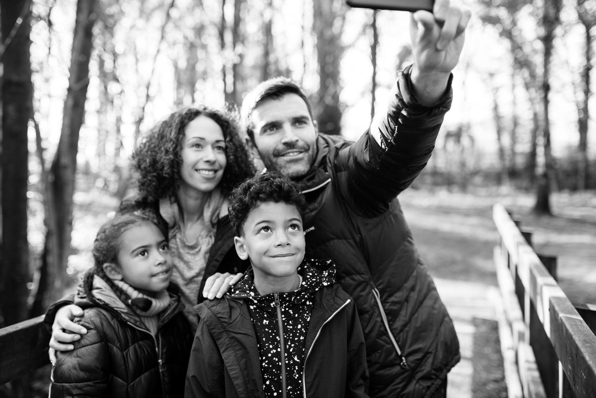 family posing for selfie