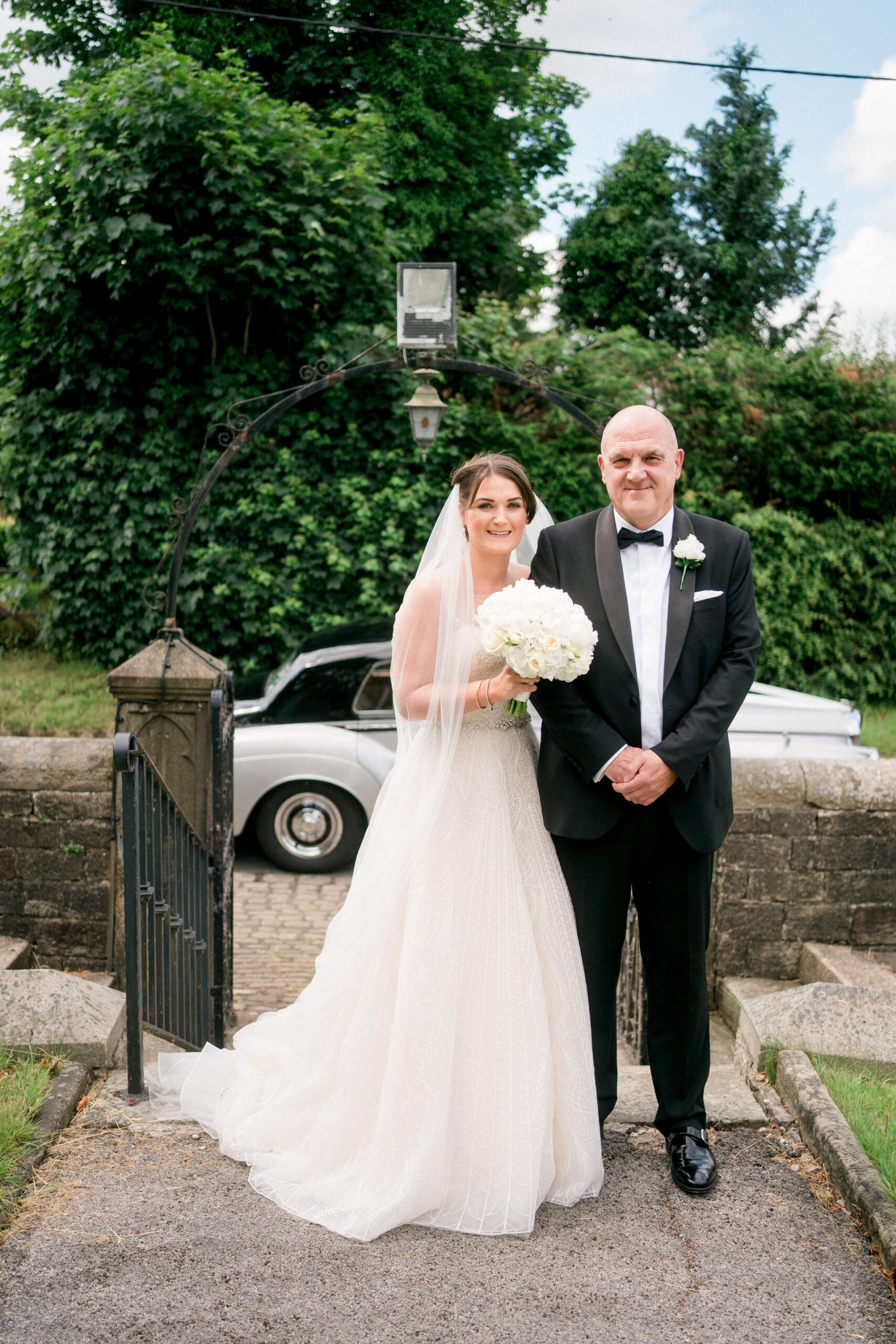 bride and her dad outside mawdesley church
