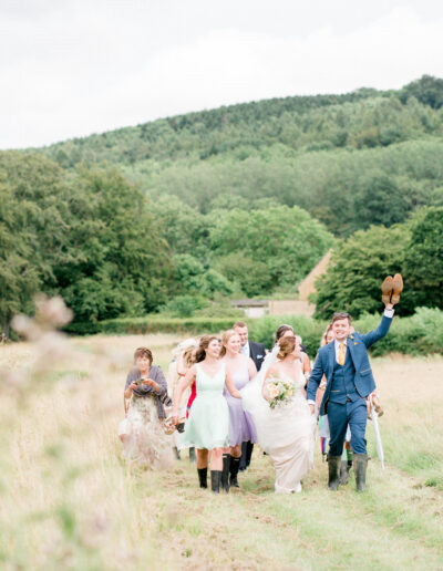 bride and groom on the cotswolds path