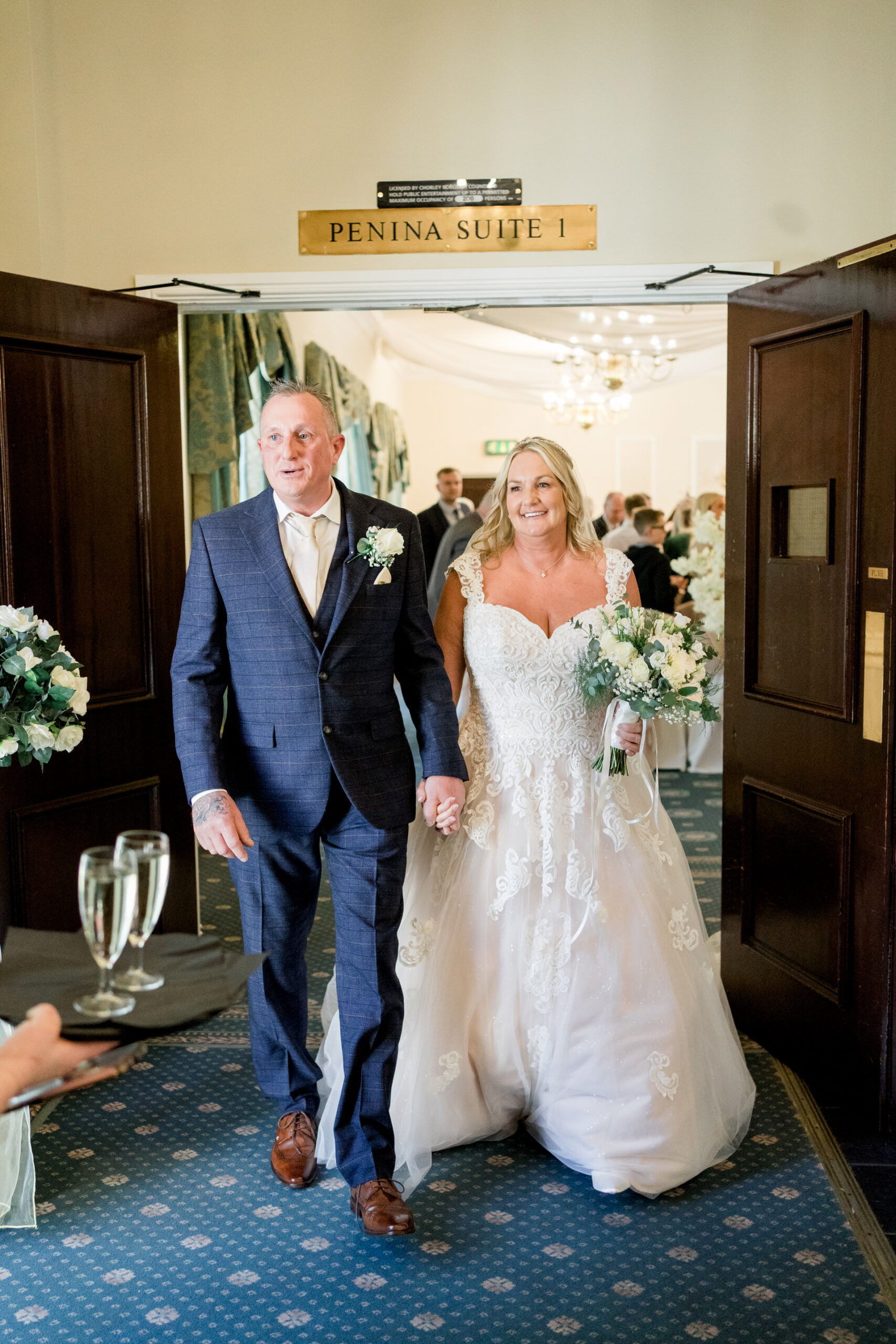 bride and groom leaving the ceremony room at shaw hill after getting married
