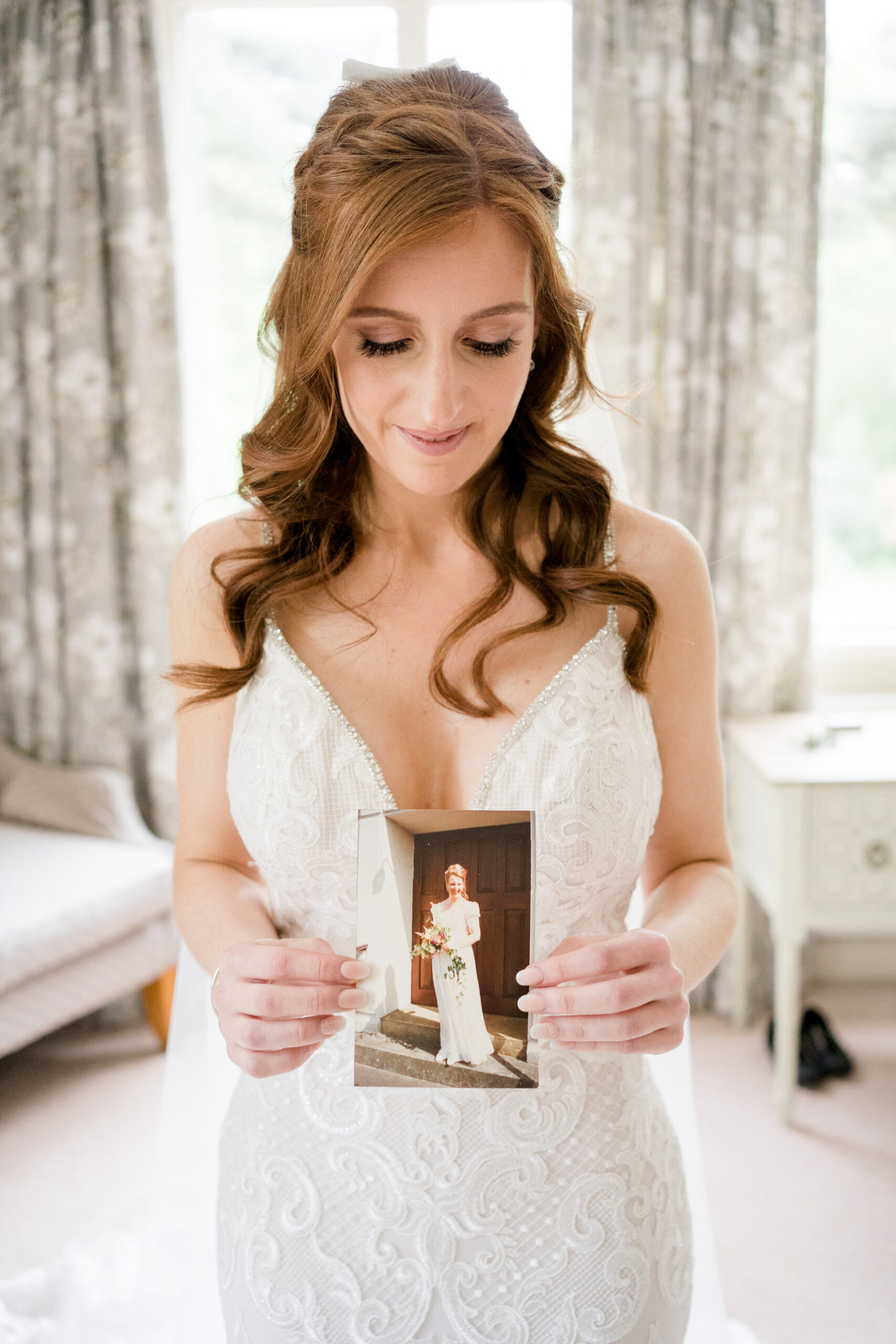 bride with a picture of her mum