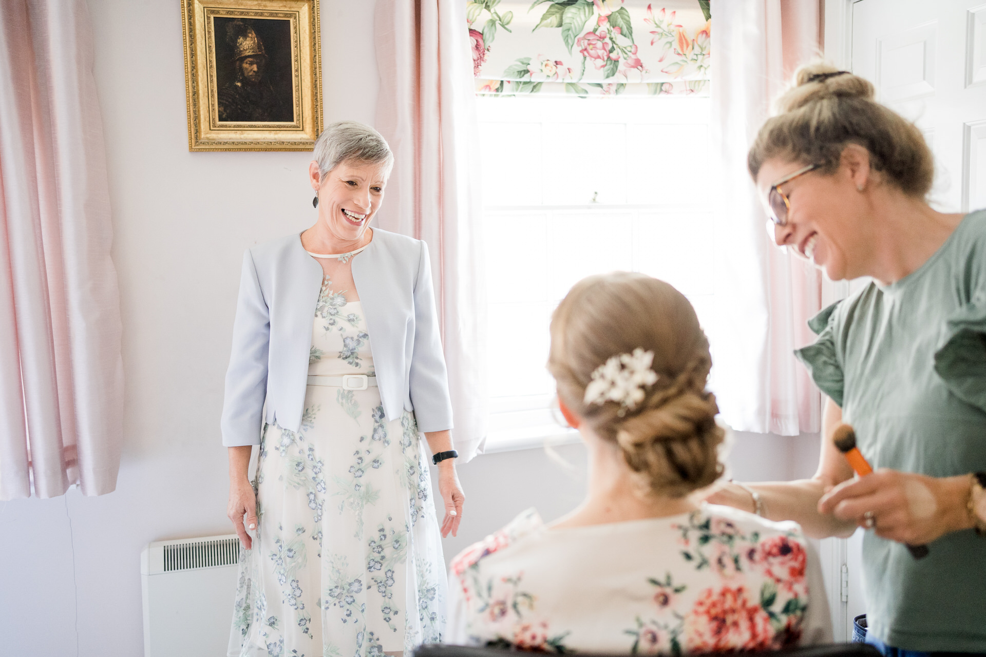 mother of the bride seeing daughter for first time