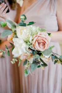 elegant flowers with blush and cream roses at Rivington Barn wedding
