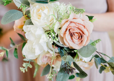 elegant flowers with blush and cream roses at Rivington Barn wedding