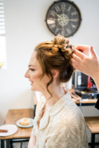 bride having hair done