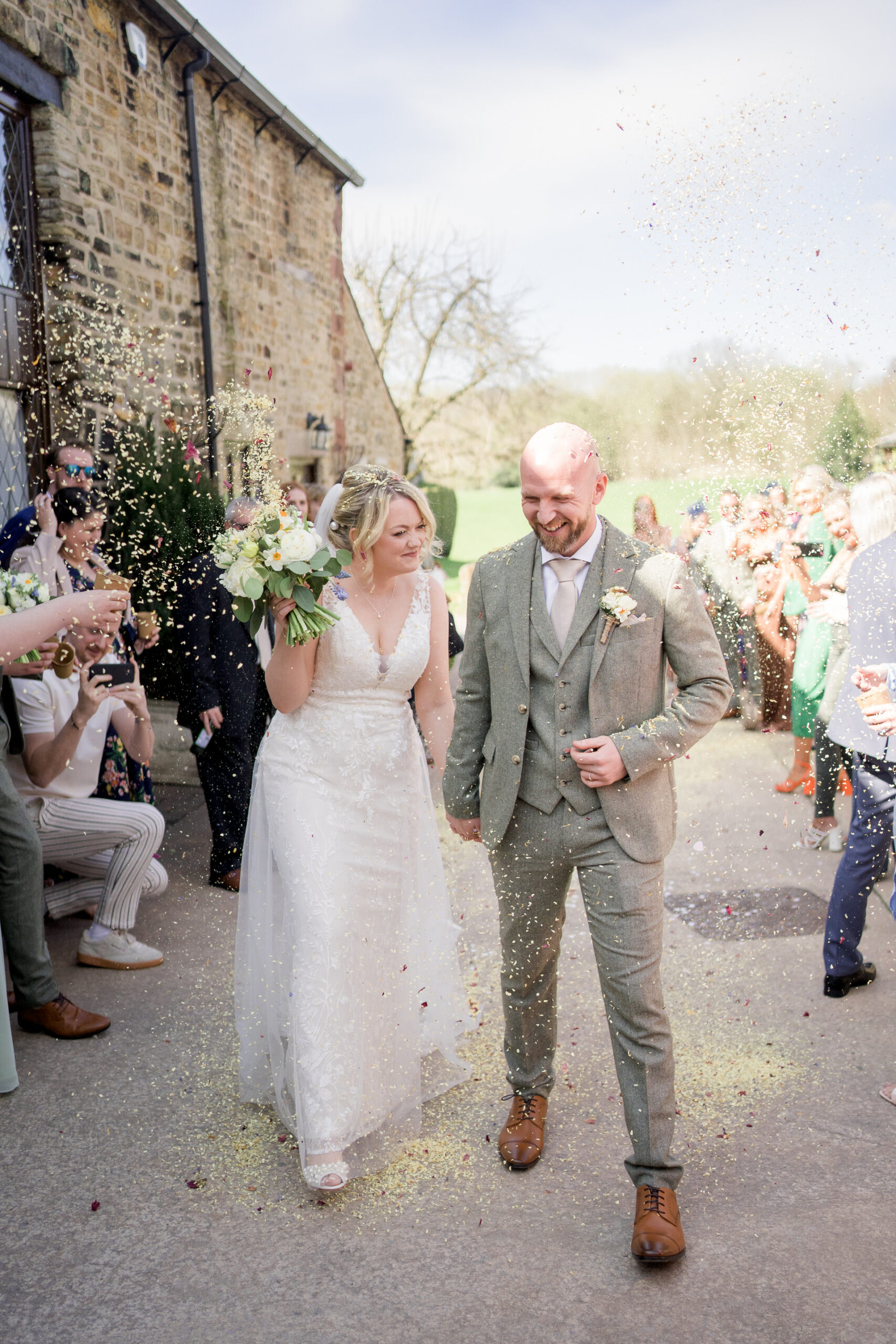 confetti throw in sunshine at Hyde bank farm wedding