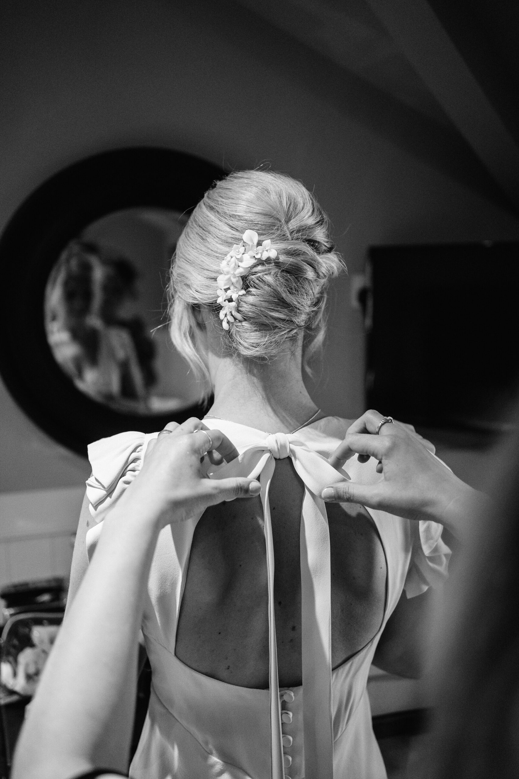 bride with ribbon backed dress at didsbury house hotel