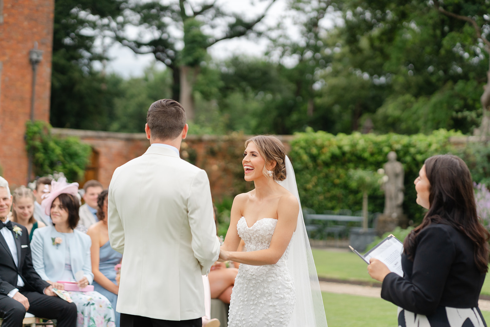 giggles during the vows for bride and groom