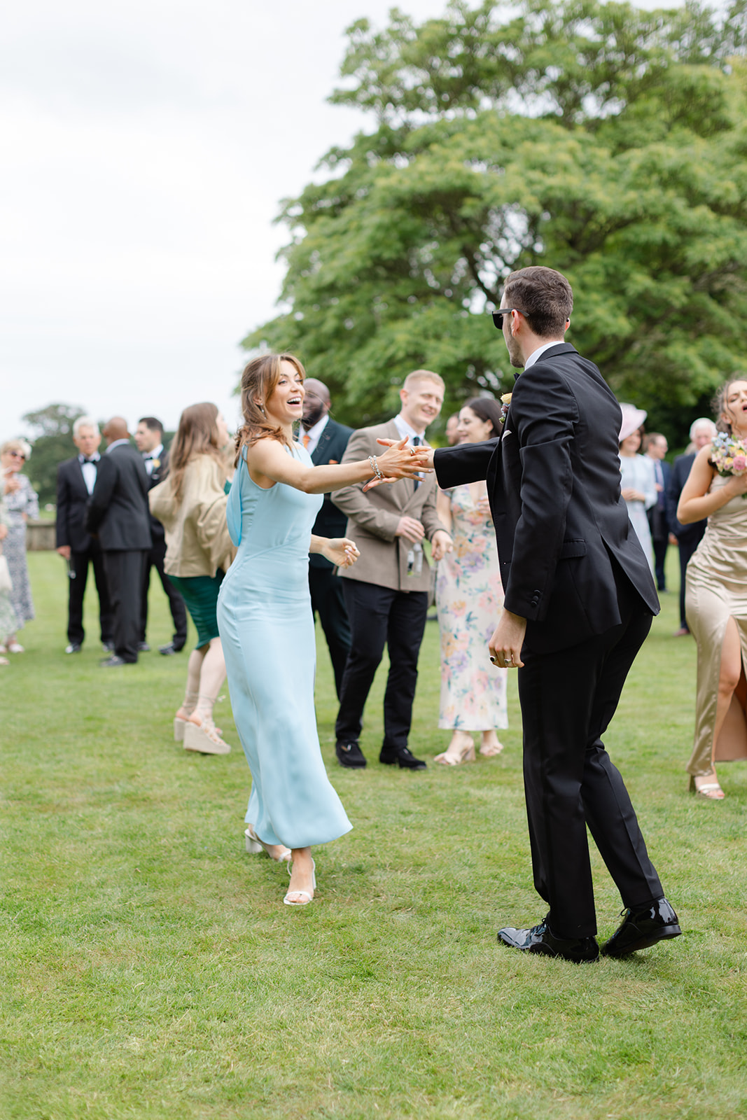 guests dance on the lawn and have fun