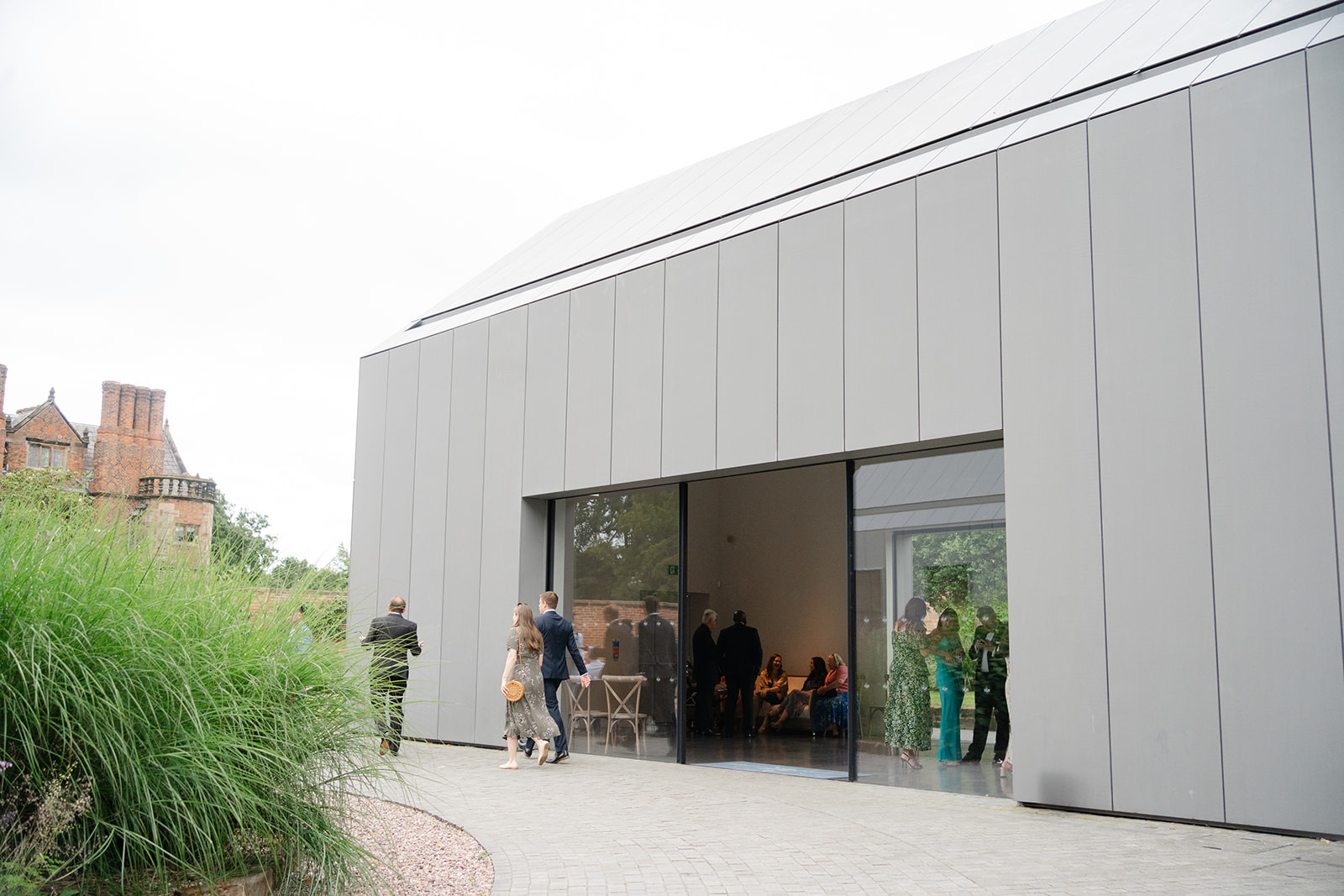 guests milling around the courtyard at Dorfold hall