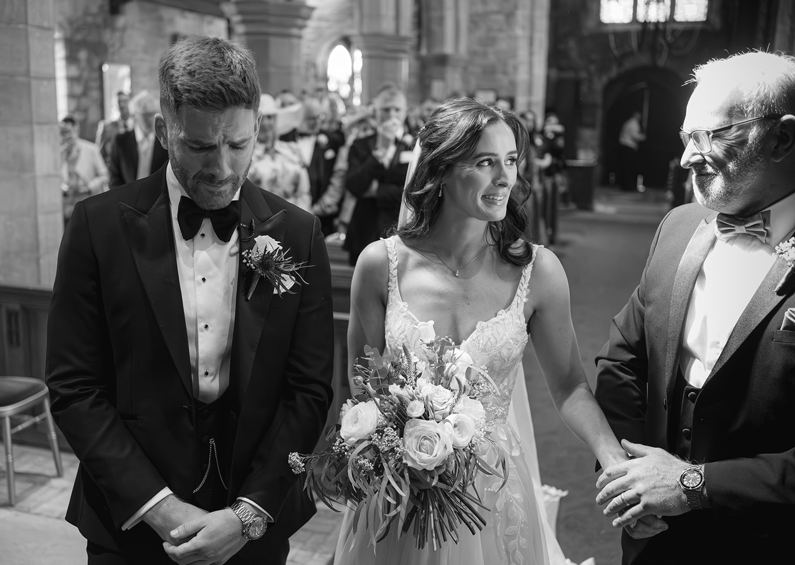 emotional groom sheds tear as bride reaches top of the aisle