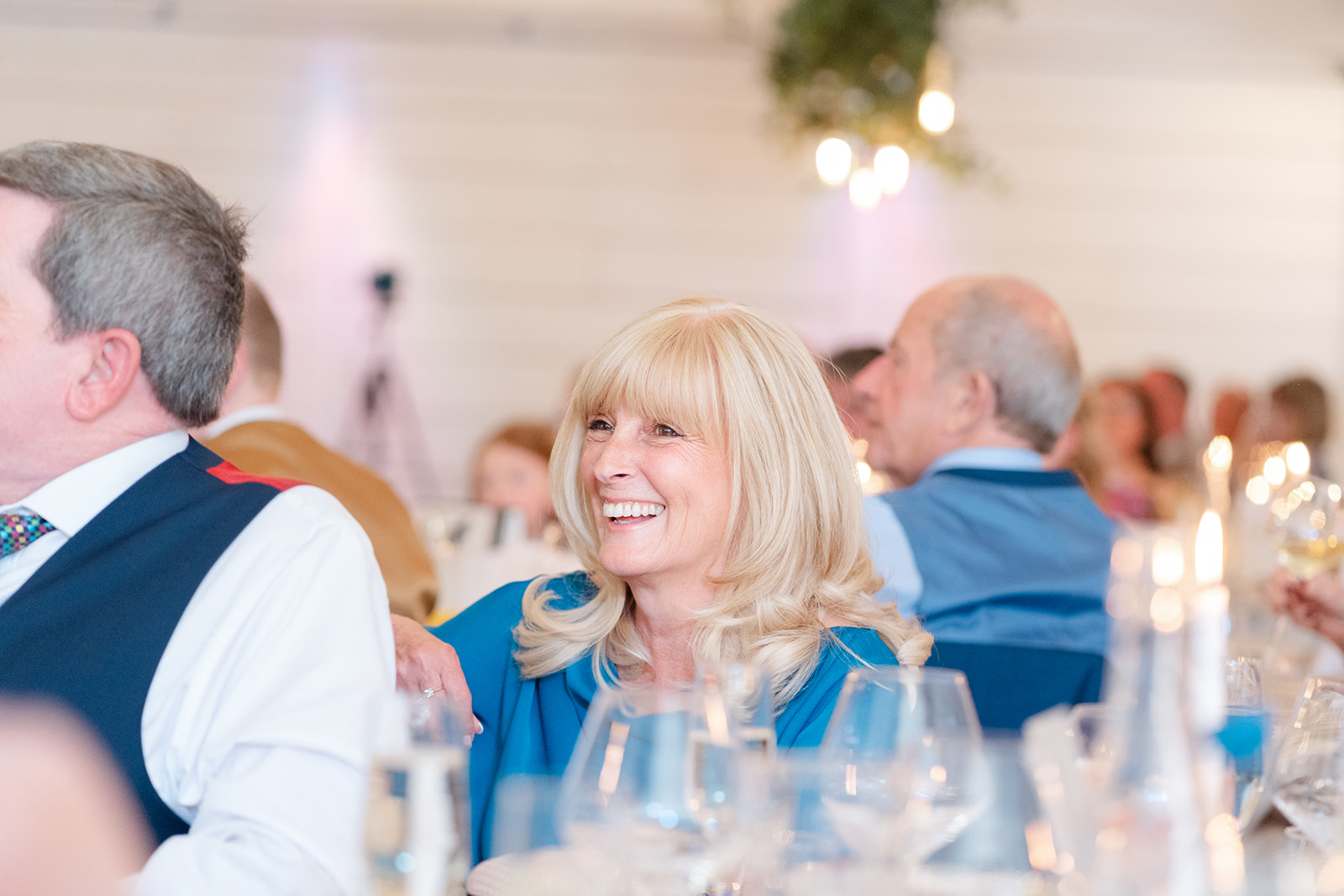 wedding guest smiles
