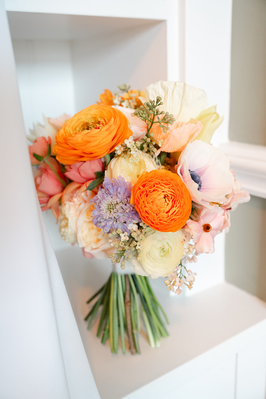 orange and pastel wedding bouquet