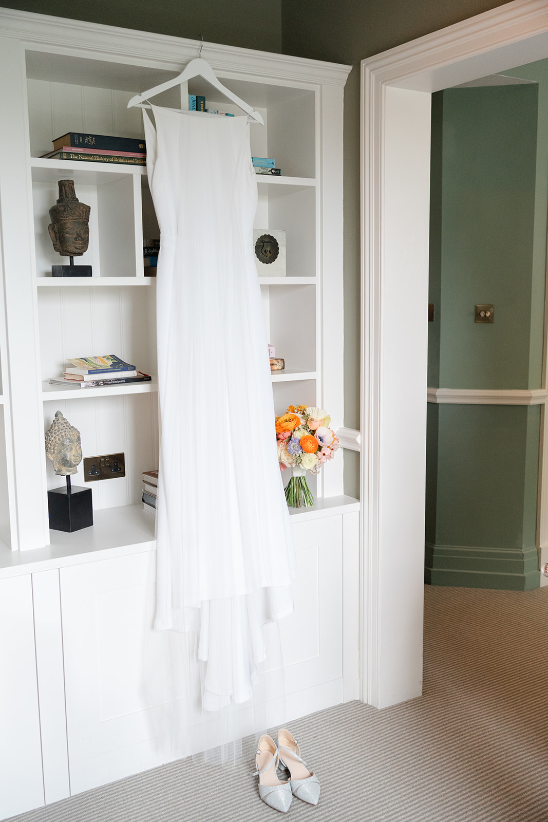 wedding dress hanging at didsbury house hotel