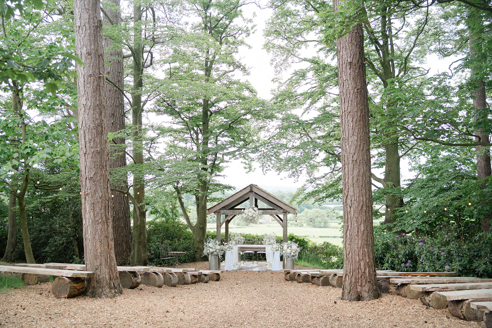 outdoor ceremony space in the woods at hobbit hill