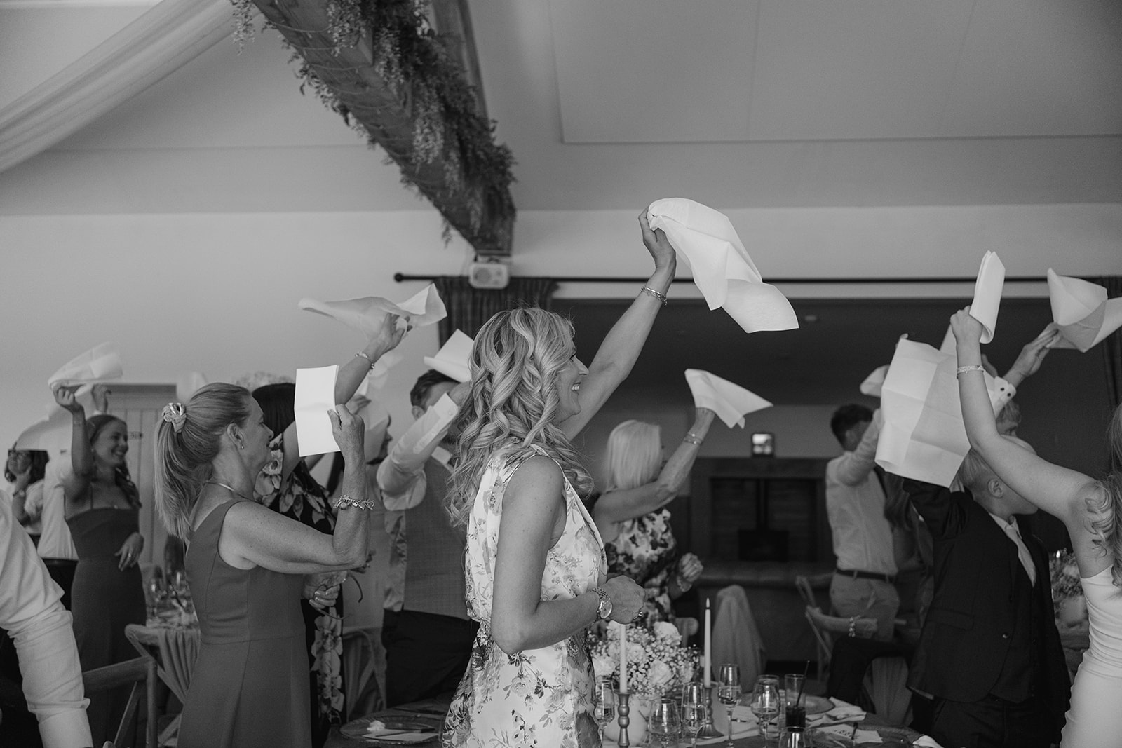 guests wave napkins at hobbit hill