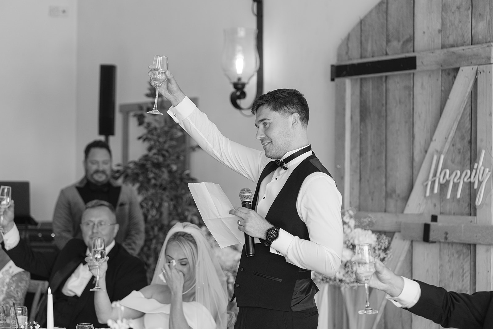 groom making a toast during speeches at hobbit hill wedding venue