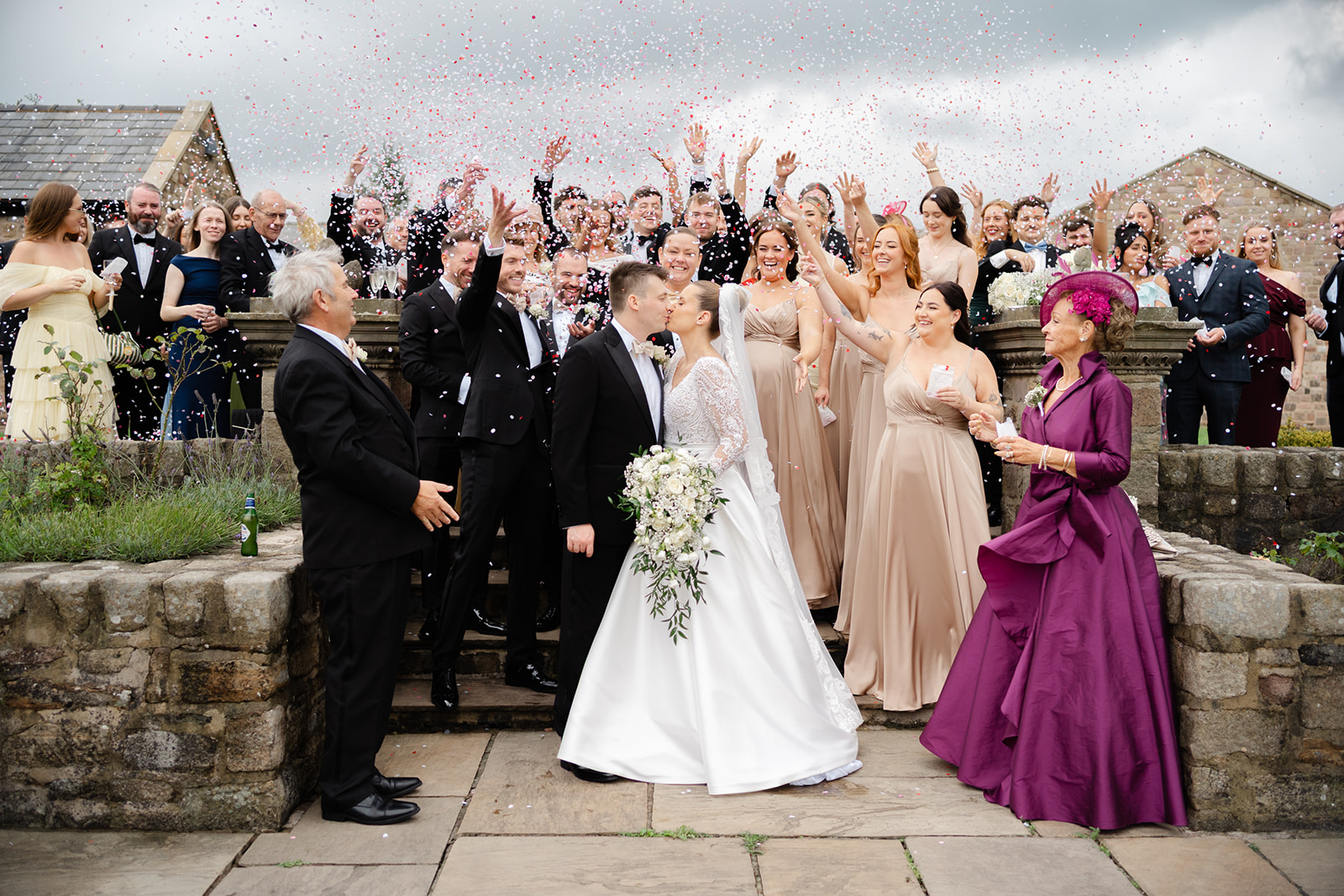 confetti photo with all guests at beeston manor wedding